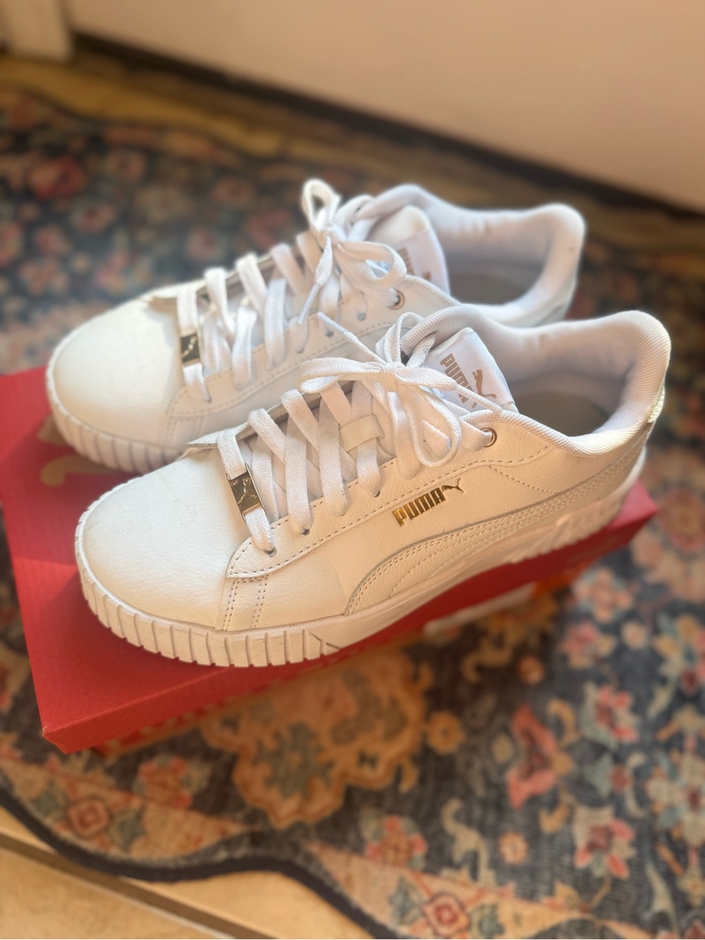 Puma Women’s White Sneakers with Gold Logo